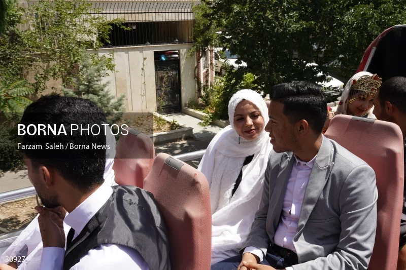 Marriage ceremony of 14 Turkmen couples in Tehran