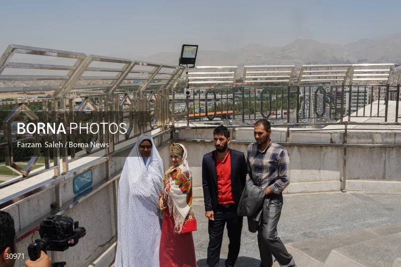 Marriage ceremony of 14 Turkmen couples in Tehran