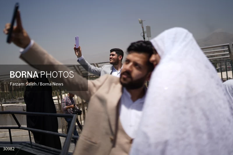 Marriage ceremony of 14 Turkmen couples in Tehran
