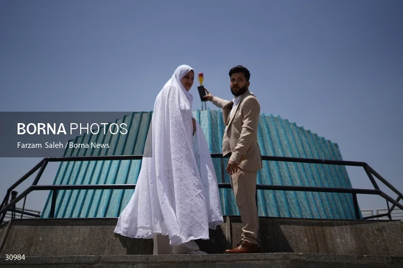 Marriage ceremony of 14 Turkmen couples in Tehran