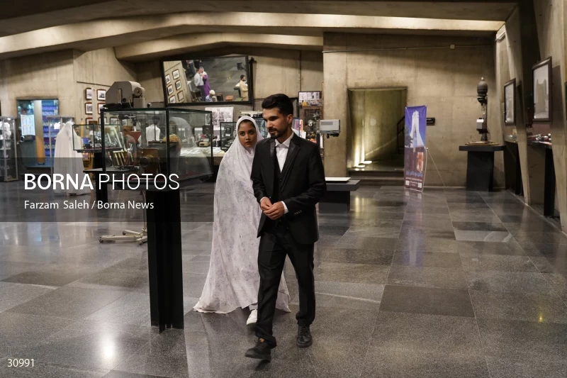 Marriage ceremony of 14 Turkmen couples in Tehran